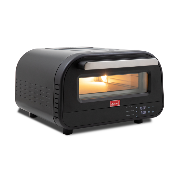 Gemelli Home Pizza Oven on White with illuminated internal light and digital display.
